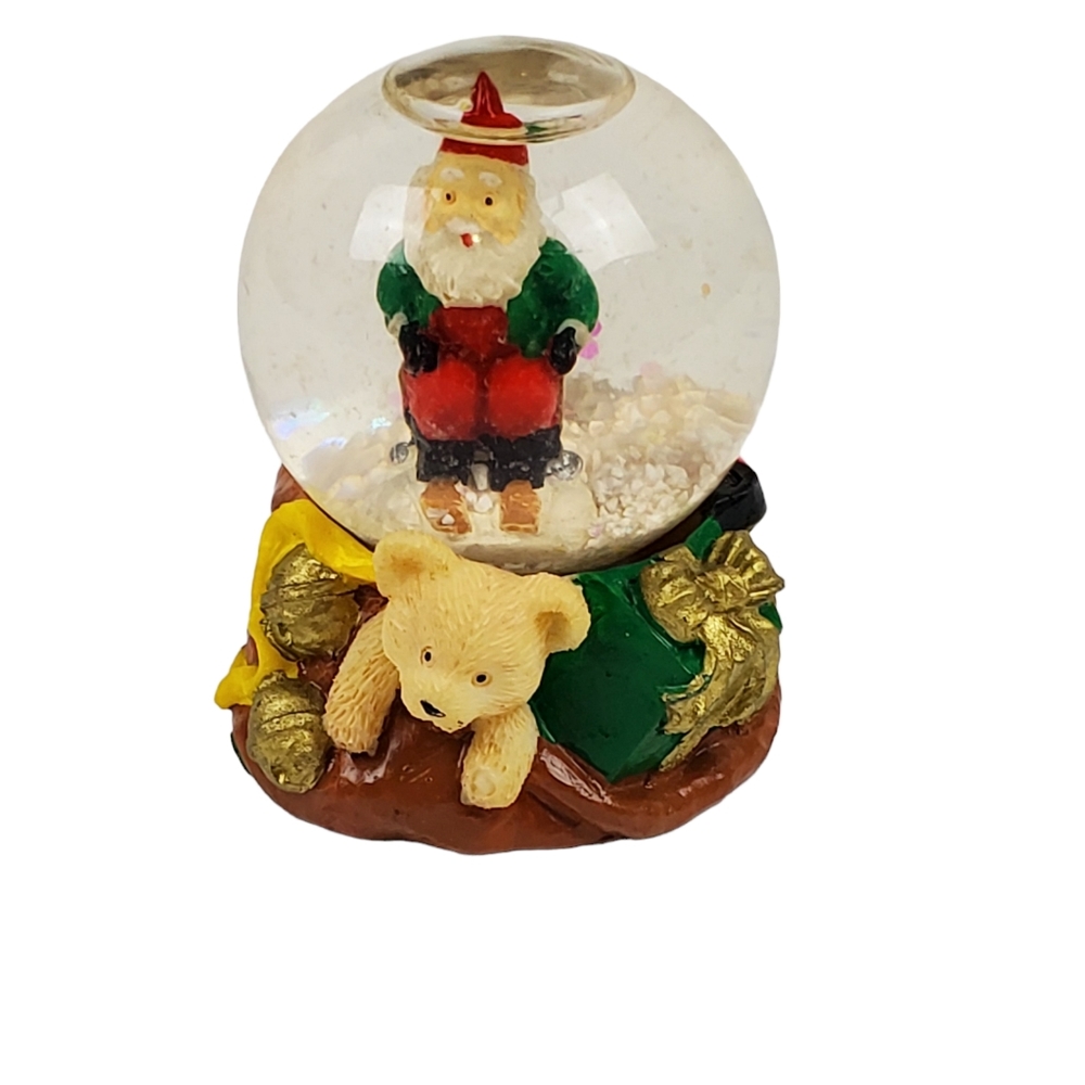 Vintage mini snow globe Santa skiing